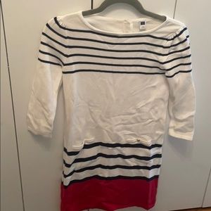 A super cute white, Navy blue, and red girls dress